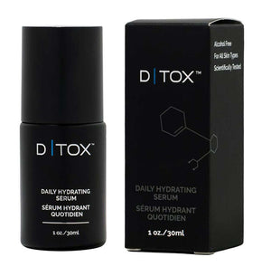 EXOIE DTOX Daily Hydrating Serum in a sleek black matte bottle with matching black box, minimalist white and blue text design