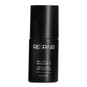 Black cylindrical plastic bottle of EXOIE REPAIR Daily Restoring Serum with white and blue text and a matte black cap.