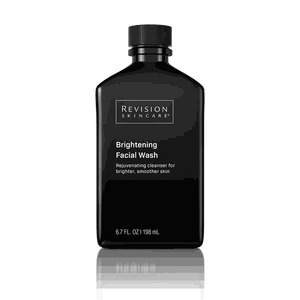 Black rectangular plastic bottle with a screw cap featuring white text labeling the Revision Skincare Brightening Facial Wash brand and product details.