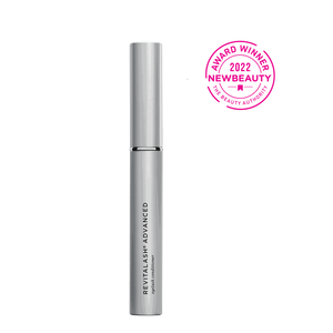 RevitaLash Advanced eyelash conditioner in sleek silver tube with black text and precision applicator cap.