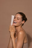 Facial sunscreen tube, Airyday Mineral Mousse Dreamscreen SPF50+, in pale pink packaging with subtle white lettering.