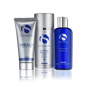 iS Clinical Post Peel collection featuring silver Sheald Recovery Balm tube, white SPF 30 Extreme Protect bottle, and blue Cleansing Complex bottle