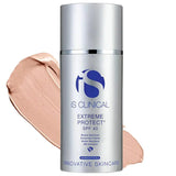 iS Clinical Extreme Protect SPF 40 facial sunscreen in a silver bottle with blue logo and text, beige cream swatch behind