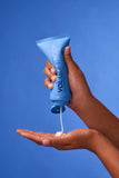 VOL.U.LIFT BODY GLP-1 Sculpt + Firm Treatment Complex being dispensed into hand