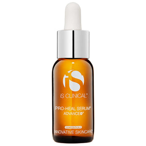 iS Clinical Pro-Heal Serum in an amber glass bottle with white dropper cap and silver collar, labeled in white text.